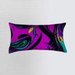 Colorful abstract design on decorative pillow.