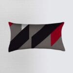 Geometric patterned rectangular decorative pillow.
