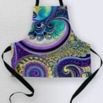Colorful patterned apron with swirls and designs.