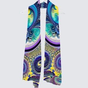 Colorful patterned scarf hanging on a hook.