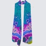 Colorful abstract scarf hanging on a hook.
