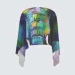 Colorful elephant-patterned scarf draped elegantly.