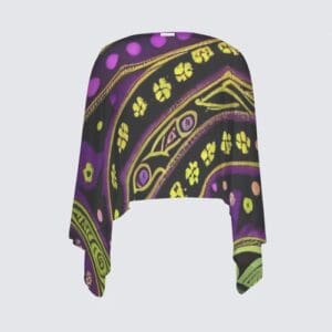 Colorful patterned shawl with fringe edges.