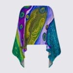 Colorful patterned scarf with abstract design.