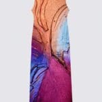 Colorful abstract dress design on display.