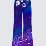 Colorful flared pants with abstract design.