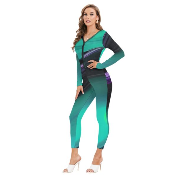 Woman in teal abstract print jumpsuit.