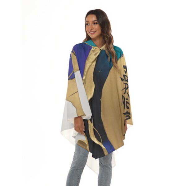 Woman wearing abstract art poncho.