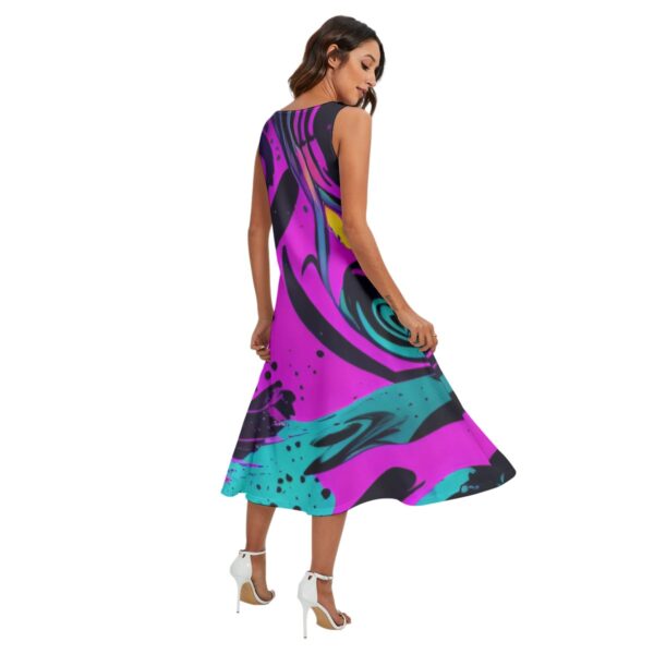 Woman in abstract print midi dress.