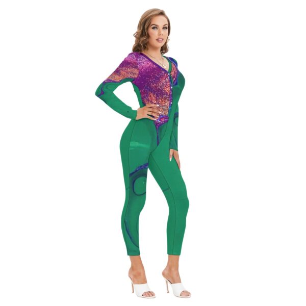 Woman in green abstract print jumpsuit.