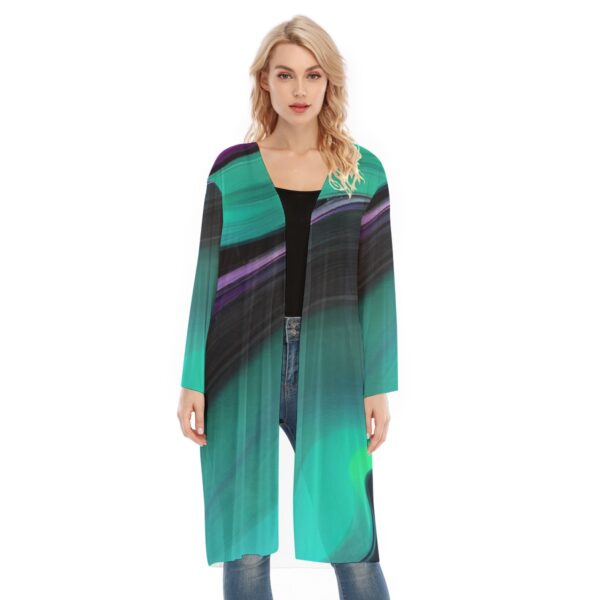 Woman wearing teal abstract print cardigan.