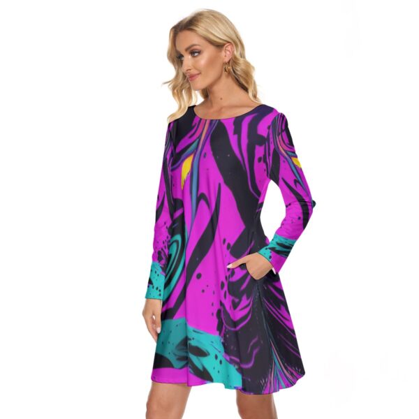 Woman in abstract print long sleeve dress.