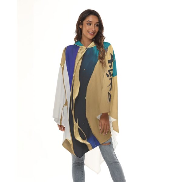 Woman in abstract art hooded poncho.