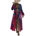 Woman in printed robe and hat.