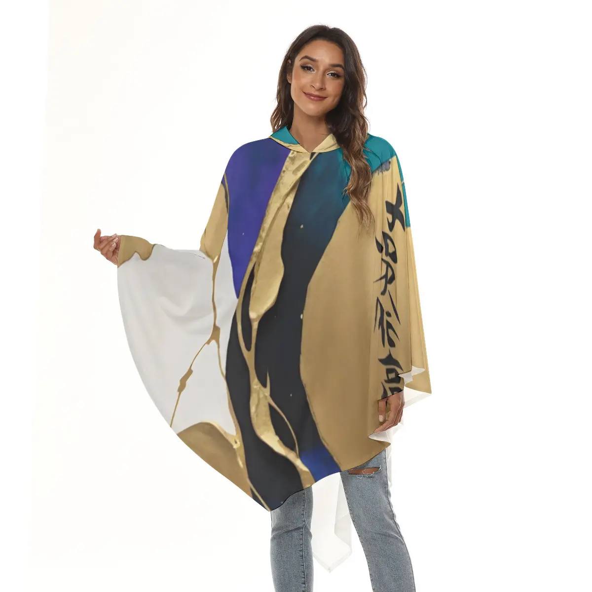 Woman wearing abstract hooded poncho.