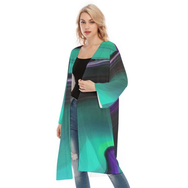 Woman in teal abstract print kimono.