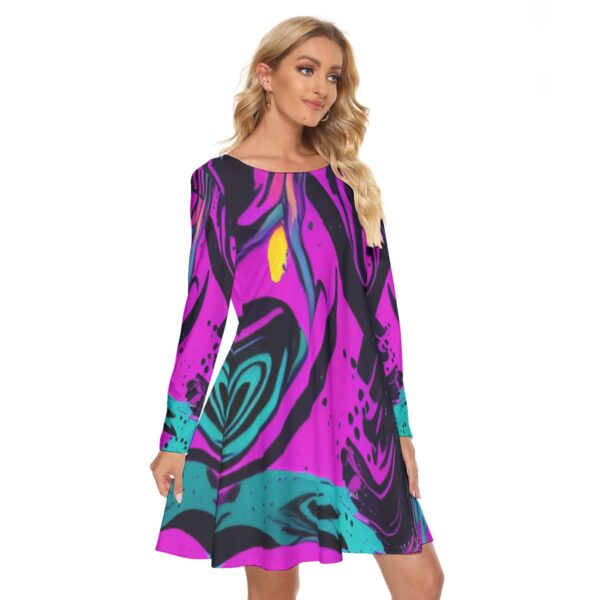 Woman in purple abstract print dress.