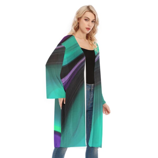 Woman in teal abstract print kimono.