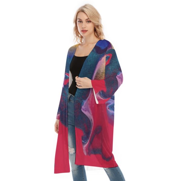 Woman in abstract print kimono cardigan.