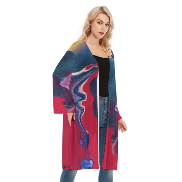 Woman wearing abstract print cardigan.