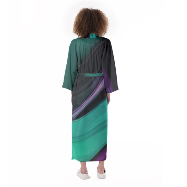 Woman in teal abstract print kimono robe.