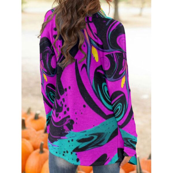 Here's an 8-word alt tag for the image: Women's purple abstract print long-sleeve blouse.