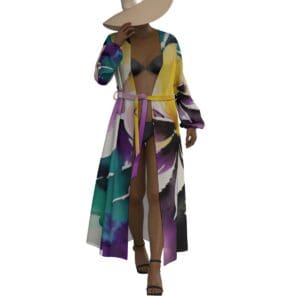 Model in colorful robe and wide-brim hat.