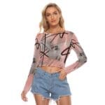 Woman wearing stylish cropped top and shorts.
