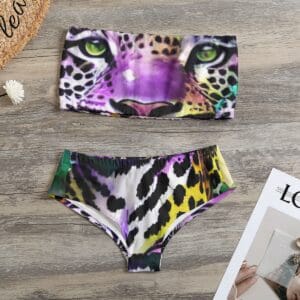 Multicolored leopard print bikini set on table.