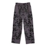 Gray patterned pants with black floral design.