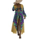 Fashion model wearing colorful beach cover-up.