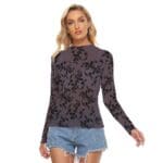 Model in patterned long-sleeve shirt and shorts.