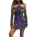 Colorful off-shoulder dress with intricate patterns.