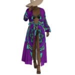 Model in stylish purple patterned cover-up.