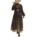 Model in colorful robe and wide-brim hat.