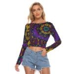 Woman in colorful patterned long-sleeve shirt.