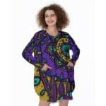 Woman in purple mandala print dress.