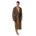 Man in patterned gold and purple robe.