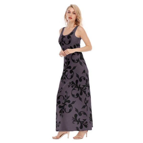 Model in sleeveless maxi dress with floral print.
