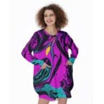 Woman in abstract print tunic dress.