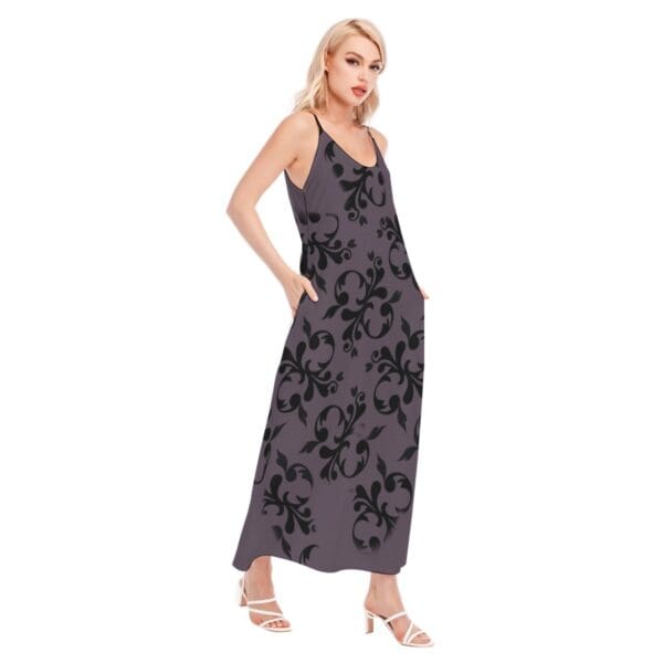 Model in purple floral maxi dress.