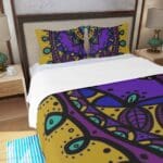 Colorful patterned bedding in a cozy bedroom.