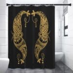 Gold paisley pattern on black shower curtain.