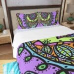Colorful mandala-patterned bedding in bedroom.
