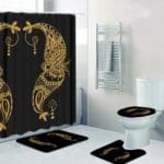 Elegant bathroom with gold patterned decor.