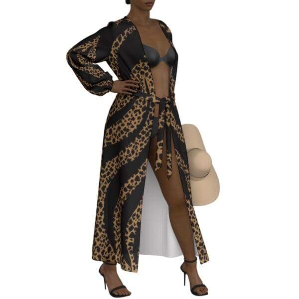 Woman in leopard-print maxi dress and hat.
