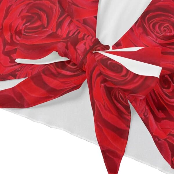 Red rose print fabric tied in a bow.