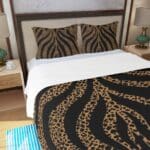 Leopard print bedding in a modern bedroom.