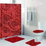 Bathroom with red rose-themed decor.