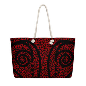Red tote bag with black swirl pattern.